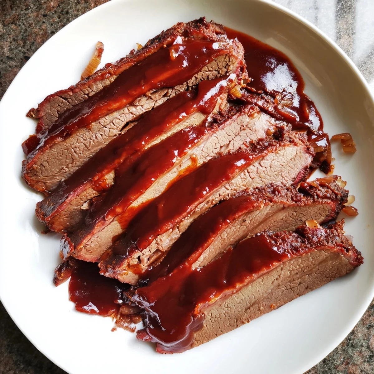Tender Slow Cooked Beef Brisket with BBQ Sauce sliced and served on a rustic wooden board.