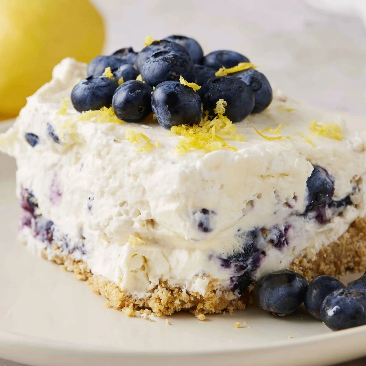 Light and refreshing no bake lemon blueberry cream cake with whipped topping