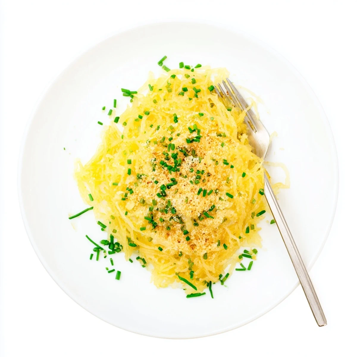 Golden roasted spaghetti squash strands coated in a creamy cheddar cheese sauce with breadcrumb topping